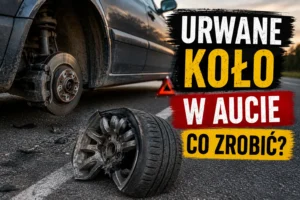 Urwane koło w aucie i unieruchomiony samochód na poboczu po awarii